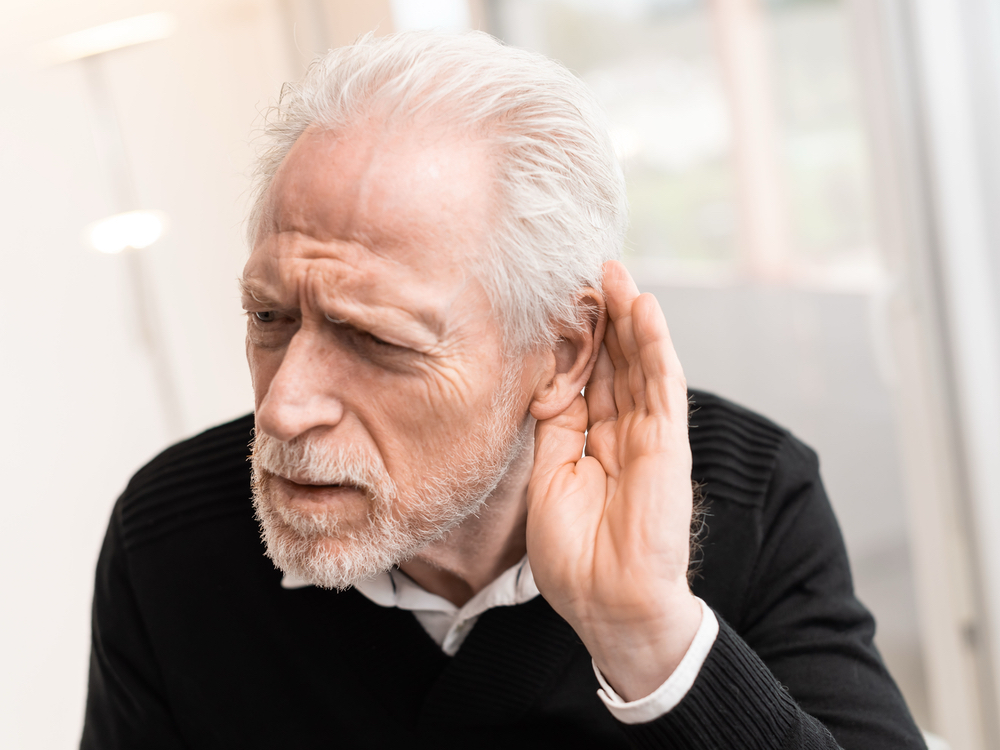 Patient learning about hearing loss types at Better Hearing Clinic in McAllen, TX